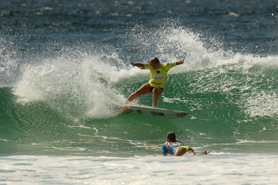 Lucy Callister taking down WCT surfer Pauline Ado in her heat at the Kommunity Pro